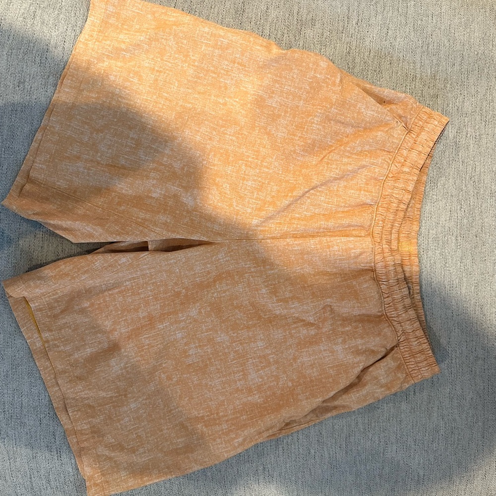 Orange men’s lululemon shorts